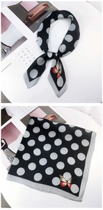 Detail of square silk scarf with classic polka dots and realistic butterfly prints