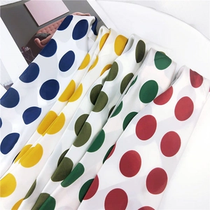 Polka dot printed small silk scarves in navy, yellow, green, and burgundy styles