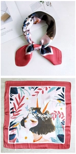 Detailed flat lay of a square silk scarf featuring artistic floral and rabbit girl illustration