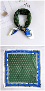 Detail view of square silk scarf with vintage green paisley pattern and blue geometric borders