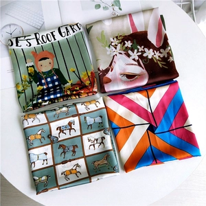 Assorted silk-like square scarves with artistic floral and equestrian prints for women
