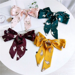 Set of four colorful slim silk scarves with alpaca prints for hair and neck styling