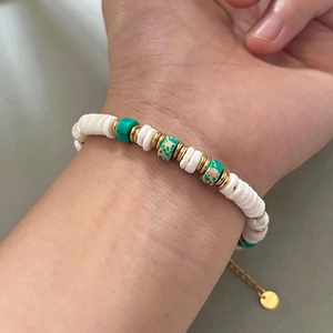 Bohemian 18k gold-plated bracelet with green turquoise stones and white disc beads