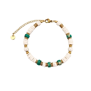 Bohemian style beaded bracelet with green turquoise, shell beads, and 18k gold accents