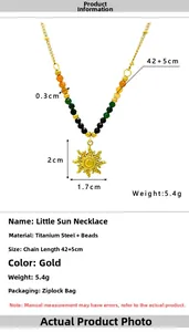 Detail view of gold sun pendant necklace with colored seed beads and size specifications