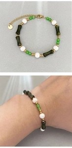 Detail of bamboo cat eye stone bracelet with pearls and S.Steel adjustable chain clasp