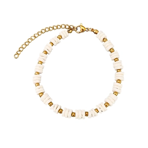 Elegant shell bead bracelet with golden accents and adjustable lobster clasp closure