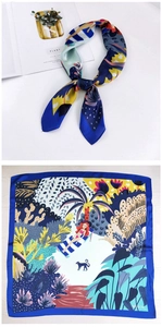 Detail of 70cm square silk scarf with blue border and tropical beach illustration