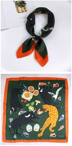 Detail of 70cm square silk scarf featuring artistic animal illustrations and orange borders