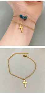 Detail of gold cross bracelet with blue raw stones, adjustable chain and lobster clasp