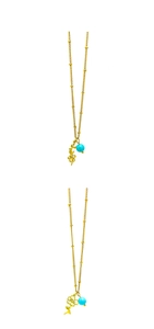 Detailed view of golden bead chain necklace with floral pendant and blue turquoise bead