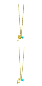 Detailed macro view of gold-plated chains with December birthstone flower charms
