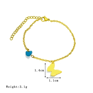 Golden stainless steel bracelet featuring butterfly charm and blue heart bead with sizing info