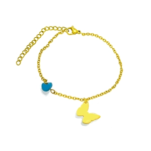 Golden bracelet featuring heart bead and butterfly charm with adjustable chain link