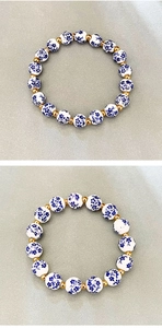 Macro view of blue and white ceramic beads and gold metal spacers on vintage bracelet