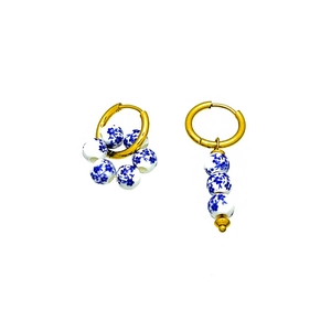 Vintage porcelain bead earrings with gold stainless steel hoops and blue floral patterns