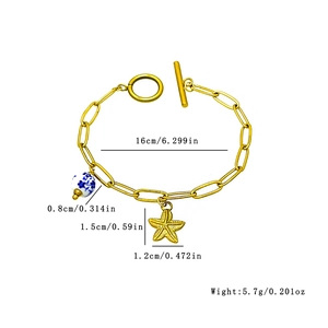 Bracelet étoile de mer en acier doré avec perle céramique et fermoir à bascule OT
