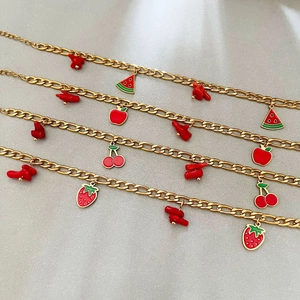 Gold plated stainless steel fruit charm bracelets with red cherry and strawberry pendants