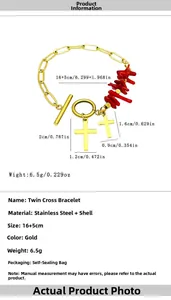 Detail of gold twin cross bracelet with red irregular shell beads and OT toggle closure