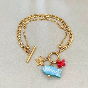 Bracelet doré double couche avec breloques étoile de mer et poisson, fermoir OT