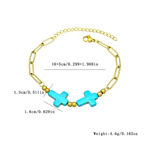 Bracciale boho a catena paperclip dorata con croci in turchese blu e dettagli di misura