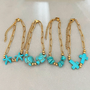 Bracciali boho dorati con ciondoli a forma di tartaruga e stella marina turchese