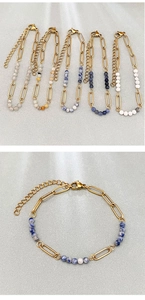 Détail de chaînes trombones en acier inoxydable plaqué or 18K avec perles de pierre