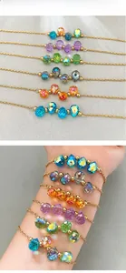 Macro view of teardrop faceted colorful crystal beads on 18k gold plated bracelet