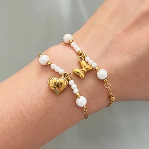 Stainless steel beaded pearl bracelet set with heart and bow pendants for women