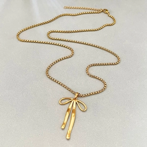French vintage golden bow pendant necklace with sleek polished finish and box chain for women