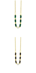 Macro detail of 18k gold plated necklace featuring malachite and tiger eye beads with pearls