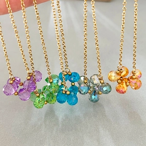 Set of six colorful faceted crystal waterdrop cluster necklaces with golden chains
