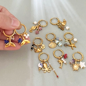 Elegant gold stainless steel ocean series hoop earrings with sea life charms for women