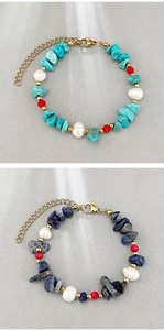 Close-up of pearl and turquoise beaded bracelets with gold-plated lobster clasp details