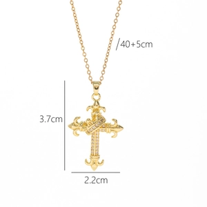 Gold hip-hop cross pendant necklace with white zircons and crown detail on white background