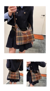 Detail view of plaid woolen shoulder bag featuring metallic chain and leather straps