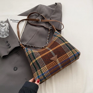 Fashion plaid shoulder bag with brown leather strap and decorative silver chain