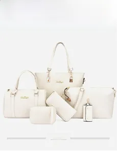 Ensemble détaillé de 6 sacs crème avec texture tissée et accessoires métalliques dorés