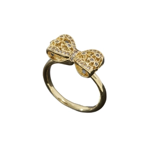 Bague élégante en forme de nœud doré pour femmes avec micro-pavage et design vintage