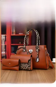 Three-piece caramel brown PU leather bag set with leopard print handles and silver locks