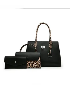 Three-piece women's handbag set featuring black lychee texture and leopard print panels