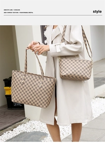 Detail view of checkerboard tote and crossbody bag set with repeat letter patterns