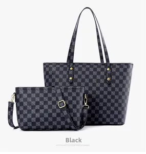 Detail view of black checkerboard tote bag and matching crossbody pouch set with gold hardware