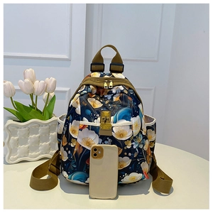 Floral print navy blue Oxford fabric small backpack with adjustable olive green straps