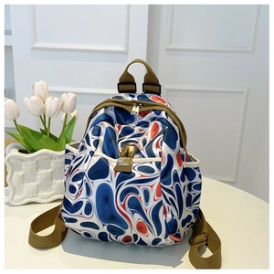 Detail view of water-resistant oxford fabric backpack with abstract marble print patterns