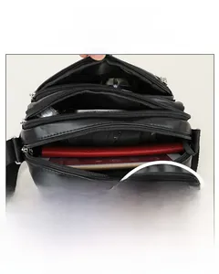 Detailed view of spacious interior compartments and quilted texture of the crossbody bag