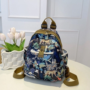 Elegant women's tropical floral and leopard print Oxford cloth backpack for stylish travel
