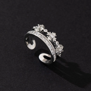 Detail of a double-layer silver adjustable ring with snowflakes and rectangular zircon