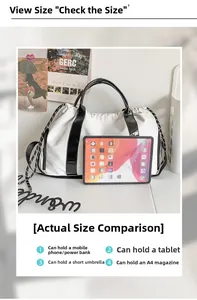 Comparaison de taille du grand sac oxford blanc avec capacité pour tablette et parapluie