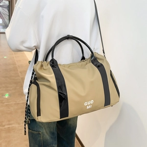 Sac de voyage imperméable en Oxford kaki avec lettrage GUO MI et sangle rayée